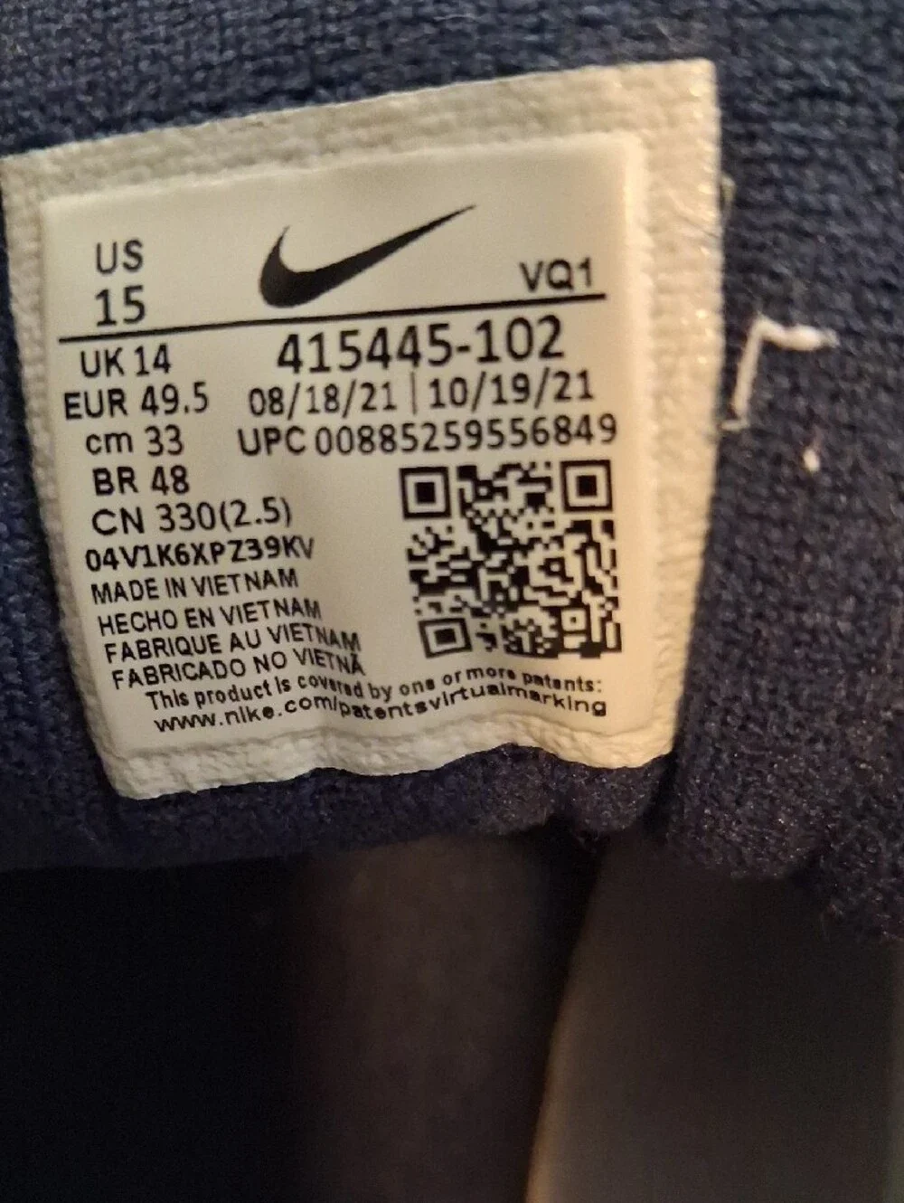 Nike White and Navy Air Monarch Low-Top Sneakers